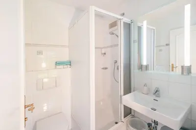 Ein Badezimmer in der Unterkunft Haus Sandra