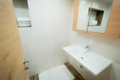 Ein Badezimmer in der Unterkunft Haus Schennach