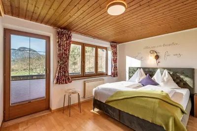 Ein Bett oder Betten in einem Zimmer der Unterkunft Haus Alpenrose