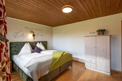 Ein Bett oder Betten in einem Zimmer der Unterkunft Haus Alpenrose