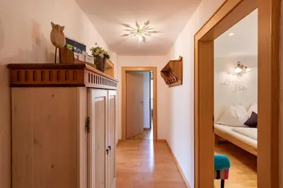 Ein Bett oder Betten in einem Zimmer der Unterkunft Haus Alpenrose