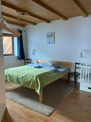 Ein Bett oder Betten in einem Zimmer der Unterkunft Ferienwohnung Bärfeld