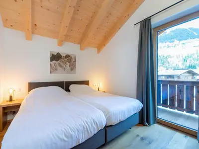Ein Bett oder Betten in einem Zimmer der Unterkunft Chalet in Neukirchen near Ski Slopes