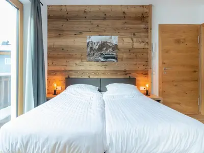 Ein Bett oder Betten in einem Zimmer der Unterkunft Chalet in Neukirchen near Ski Slopes