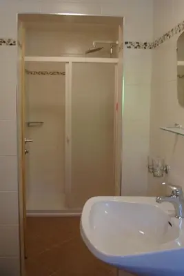 Ein Badezimmer in der Unterkunft Appartements Schwoagerhof