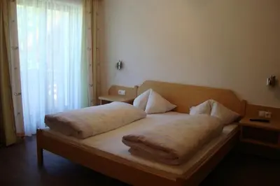 Ein Bett oder Betten in einem Zimmer der Unterkunft Appartements Schwoagerhof