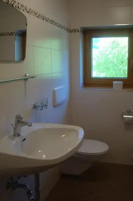 Ein Badezimmer in der Unterkunft Appartements Schwoagerhof
