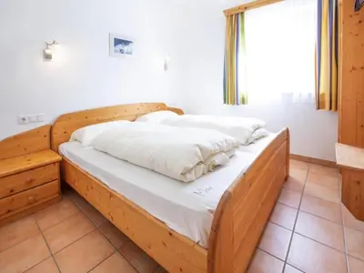 Ein Bett oder Betten in einem Zimmer der Unterkunft Chalet in Filzsteinalpe near Ski Slopes
