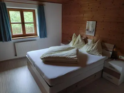 Ein Bett oder Betten in einem Zimmer der Unterkunft Ferienwohnung Waldblick