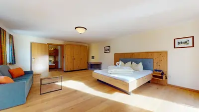 Ein Bett oder Betten in einem Zimmer der Unterkunft Hotel Daxer