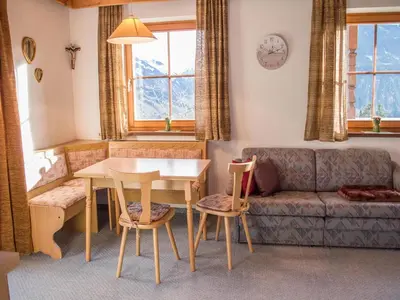 Ein Sitzbereich in der Unterkunft Rauchenbacher Apartments, Mittersill