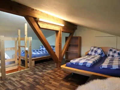 Ein Bett oder Betten in einem Zimmer der Unterkunft Cabin in Brixental by Ski Lift Access