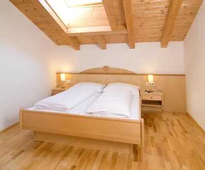 Ein Bett oder Betten in einem Zimmer der Unterkunft Penthouse Kurz