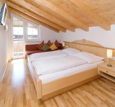 Ein Bett oder Betten in einem Zimmer der Unterkunft Penthouse Kurz