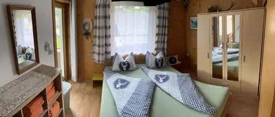 Ein Bett oder Betten in einem Zimmer der Unterkunft Ferienhaus Spitaler