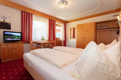 Ein Bett oder Betten in einem Zimmer der Unterkunft Appartement Schöne Aussicht