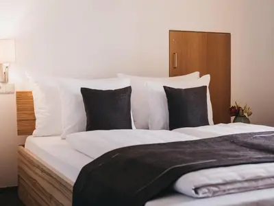 Ein Bett oder Betten in einem Zimmer der Unterkunft Residence Kristall