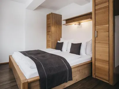 Ein Bett oder Betten in einem Zimmer der Unterkunft Residence Kristall