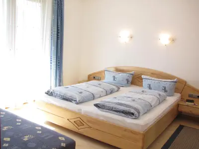 Ein Bett oder Betten in einem Zimmer der Unterkunft Landhaus Argus
