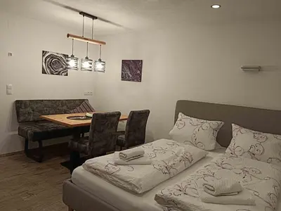 Ein Bett oder Betten in einem Zimmer der Unterkunft Landhaus Argus