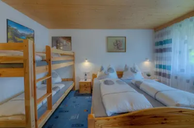 Ein Bett oder Betten in einem Zimmer der Unterkunft Ferienhaus Schweinberger