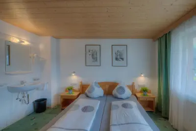 Ein Bett oder Betten in einem Zimmer der Unterkunft Ferienhaus Schweinberger