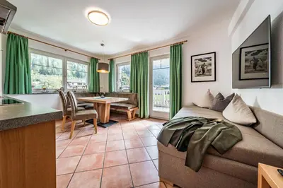 Ein Sitzbereich in der Unterkunft Gästehaus Wiesengrund & Apart Sporer