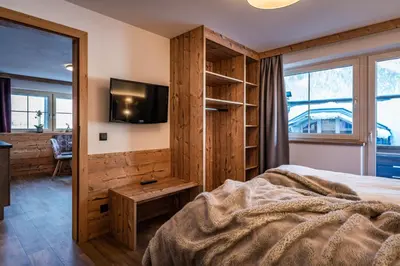 Ein Bett oder Betten in einem Zimmer der Unterkunft Gästehaus Wiesengrund & Apart Sporer