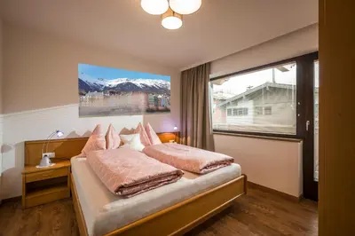 Ein Bett oder Betten in einem Zimmer der Unterkunft Ferienwohnungen Hochfilzer