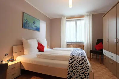 Ein Bett oder Betten in einem Zimmer der Unterkunft Apartment Alpine by Apartment Managers