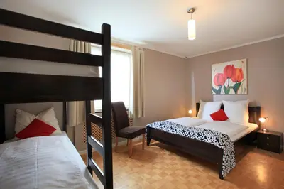 Ein Bett oder Betten in einem Zimmer der Unterkunft Apartment Alpine by Apartment Managers