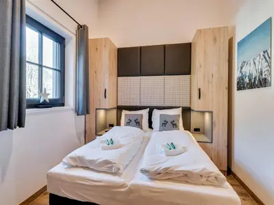 Ein Bett oder Betten in einem Zimmer der Unterkunft Chalet in Krimml near Zillertal Ski Arena