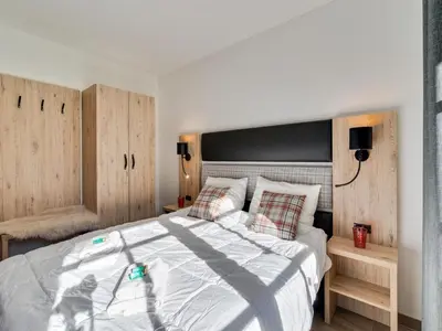 Ein Bett oder Betten in einem Zimmer der Unterkunft Chalet in Krimml near Zillertal Ski Arena