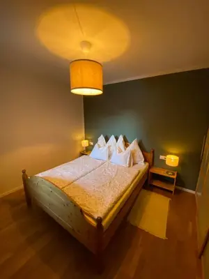Ein Bett oder Betten in einem Zimmer der Unterkunft Genner