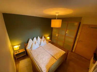 Ein Bett oder Betten in einem Zimmer der Unterkunft Genner