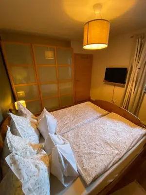 Ein Bett oder Betten in einem Zimmer der Unterkunft Genner