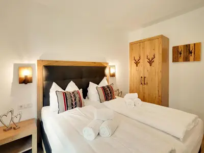 Ein Bett oder Betten in einem Zimmer der Unterkunft Chalet in Krimml near Zillertal Ski Arena