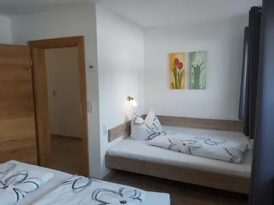 Ein Bett oder Betten in einem Zimmer der Unterkunft Ferienwohnung Innerbichler