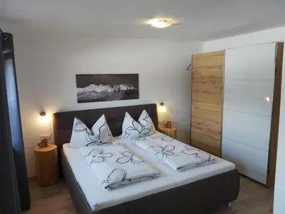 Ein Bett oder Betten in einem Zimmer der Unterkunft Ferienwohnung Innerbichler