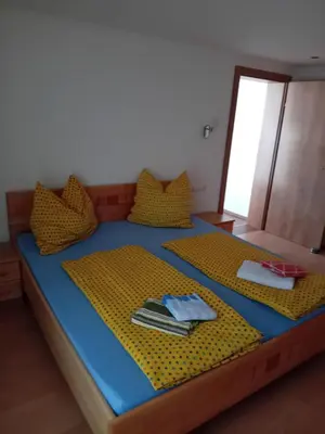 Ein Bett oder Betten in einem Zimmer der Unterkunft Ferienhaus Hochwimmer