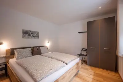 Ein Bett oder Betten in einem Zimmer der Unterkunft Haus Klingenschmid