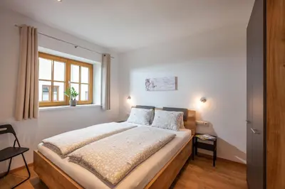 Ein Bett oder Betten in einem Zimmer der Unterkunft Haus Klingenschmid