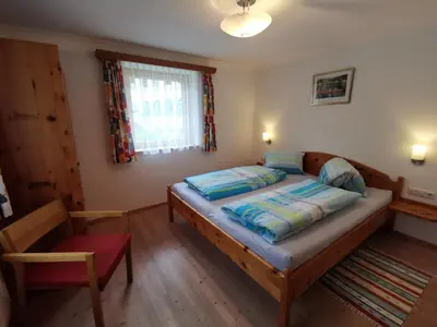Ein Bett oder Betten in einem Zimmer der Unterkunft Ferienwohnung Maierhofer