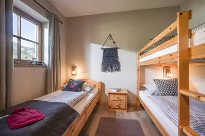 Ein Bett oder Betten in einem Zimmer der Unterkunft Apartment Enzian