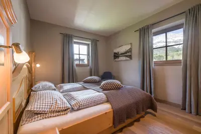 Ein Bett oder Betten in einem Zimmer der Unterkunft Apartment Enzian