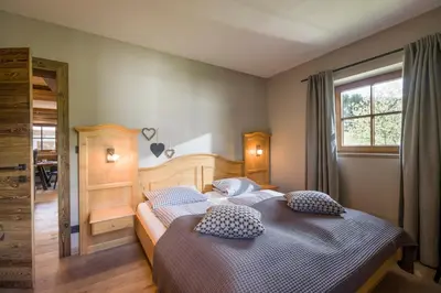 Ein Bett oder Betten in einem Zimmer der Unterkunft Apartment Enzian
