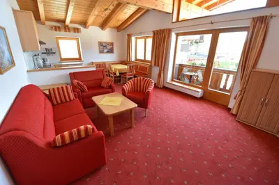 Ein Sitzbereich in der Unterkunft Stöcklbauer Kirchberg in Tirol