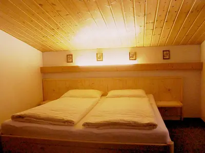 Ein Bett oder Betten in einem Zimmer der Unterkunft Brandtnerhof Betriebe