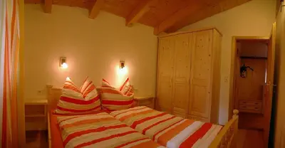 Ein Bett oder Betten in einem Zimmer der Unterkunft Ferienwohnung Steiner