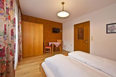 Ein Bett oder Betten in einem Zimmer der Unterkunft Appartements Staudacher